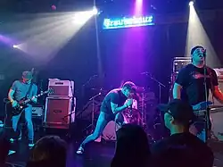 Slick Shoes performing in 2016