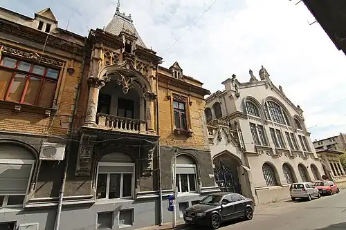 Gothic Revival - Hermann I.Rieber House (left) and carriage factory (right), Bucharest, by Siegfrid Kofczinsky, 1903[51]