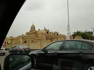 Historic palace building with European colonial architecture, now converted to educational use