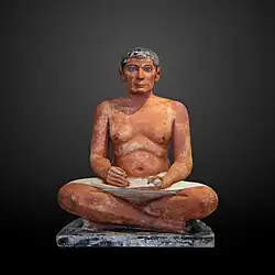 The Seated Scribe; 2613–2494&nbsp;BC; painted limestone and inlaid quartz; height: 53.7&nbsp;cm
