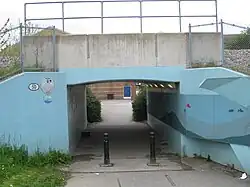 Short pedestrian underpass beneath a railway line