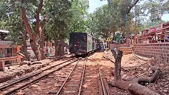 View of a train entering Matheran railway station