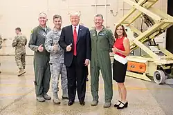 President Donald J. Trump poses for a photo with Brig. Gen. Todd Canterbury, Chief Master Sgt. Ronald Thompson, Col. Bryan Cook and U.S. Rep. Martha McSally, R-Ariz. after participating in a defense capability tour Friday, October 19, 2018, at Luke Air Force Base, Ariz.