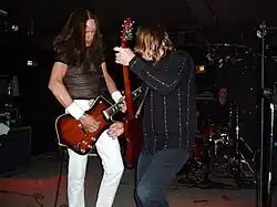 Urge Overkill performing in 2004