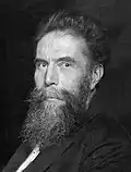 Black-and-white photographic portrait of Wilhelm Röntgen, photographed by German photographer Nicola Perscheid in 1915