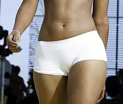 A model in white boyshorts