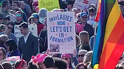 A poster of the song's lyrics with the hashtag #getinformed