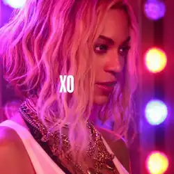 Side profile of Beyonce against the violet and orange hues of LED lights