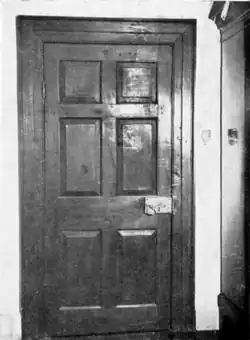 North bedroom door, 18th-century. One of the few remaining unmodernised parts of the north wing.[3]