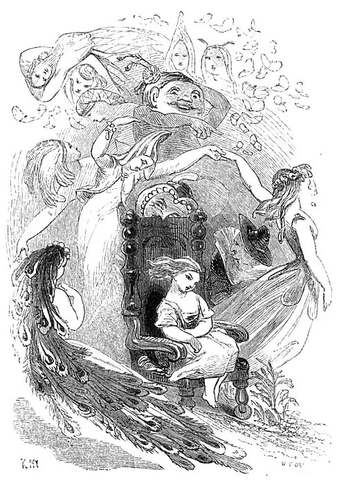 Snowflower sitting in Granny's chair surrounded by fairies