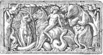 Wood carving of Mowgli riding Bagheera