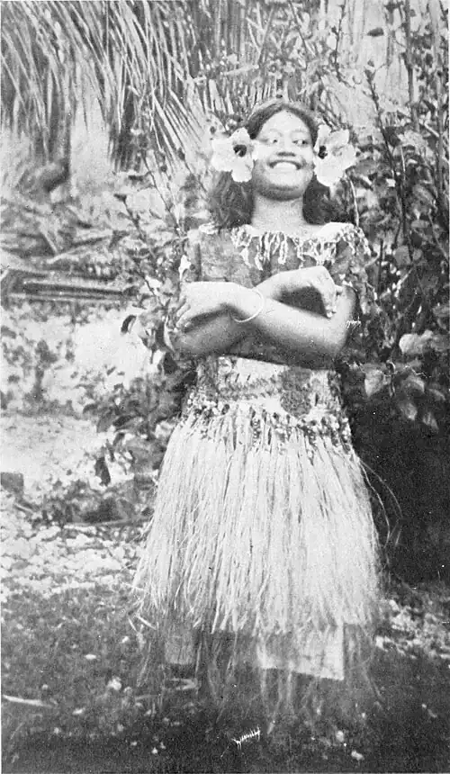 Samoan woman with hibiscus flowers in her hair