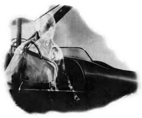 A ghostly pilot stands next to a fighter plane