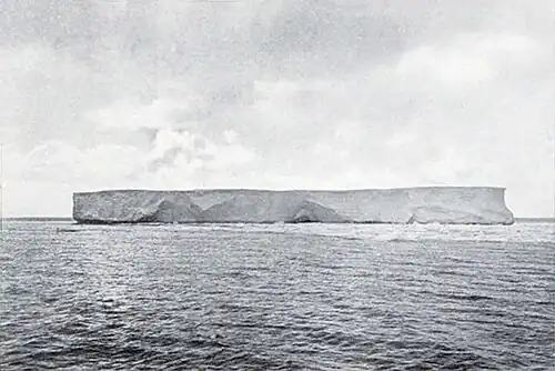 Photo of a tabular berg in the middle distance