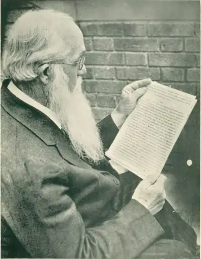 Author Ernest Vincent Wright, seen here reading the manuscript of his novel