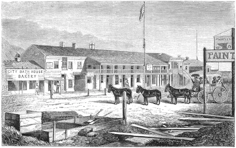 Etching of a streetscape featuring a long two-story building, a team-drawn carriage, and incomplete construction in the foreground