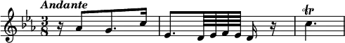 { \tempo \markup \italic "Andante" \key ees \major \time 3/8 \relative a' {
  r16*1/2 aes8[ g8. c16*1/2] |
  ees,8.[ d64 ees f ees] d16 r | c'4.\trill } }