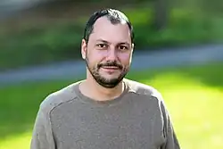 Riccardo Coccioli, Staff Site Reliability Engineer