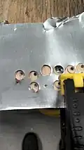 A few examples of failed attempts at drilling out washers.