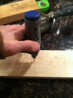 Step 5: Measured the wood and drilled holes in appropriate places. (at 4.5 ", 9 , and 13.5 ".