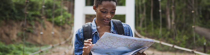 traveler looking at map
